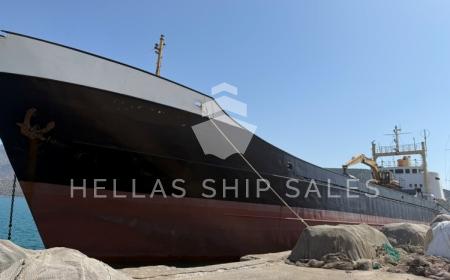 GENERAL CARGO VESSEL WITH EXCAVATOR.