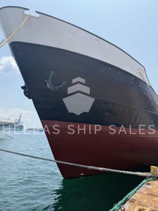 GENERAL CARGO VESSEL WITH EXCAVATOR.